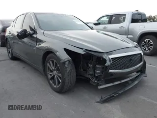 2015 Infiniti Q50 Premium with VIN JN1BV7AP1FM355875, listed as a IAAI auction lot 41777679 with 100,827 mi miles. Bid and sale history available at carsss.com. Image 1.