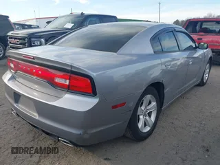 2014 Dodge Charger SE with VIN 2C3CDXBG5EH251804, listed as a IAAI auction lot 41659780 with 207,956 mi miles. Bid and sale history available at carsss.com. Image 4.