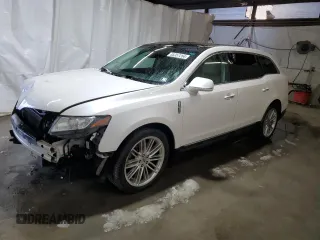 2016 Lincoln MKT EcoBoost with VIN 2LMHJ5AT8GBL01646, listed as a Copart auction lot 85357264 with 77,066 mi miles and Salvage Title. Bid and sale history available at DreamBid. Image 1.