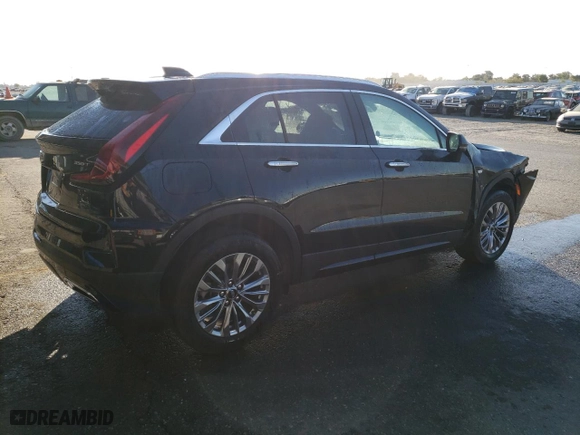 2024 Cadillac XT4 AWD Premium Luxury with VIN 1GYFZDR49RF128402, listed as a Copart auction lot 77630154 with 20,673 mi miles and Salvage Title. Bid and sale history available at carsss.com. Image 3.