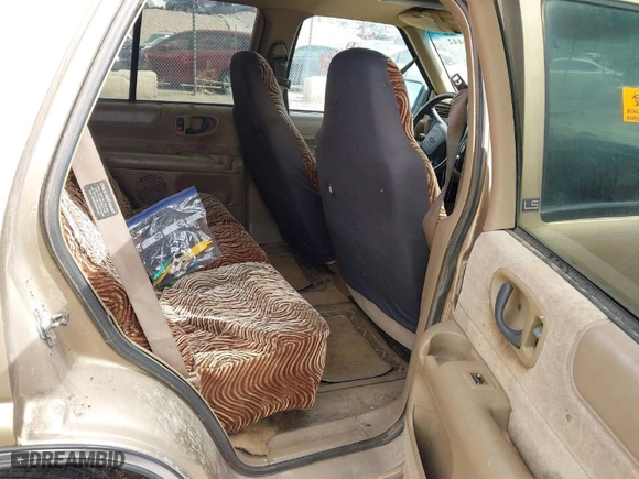 1999 Chevrolet Blazer LS with VIN 1GNDT13W1X2132656, listed as a IAAI auction lot 41784442 with 144,999 mi miles. Bid and sale history available at carsss.com. Image 8.