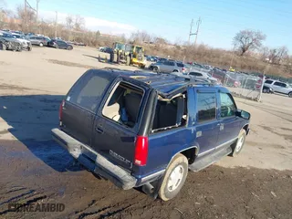 1998 Chevrolet Tahoe with VIN 1GNEK13R4WJ371916, listed as a IAAI auction lot 41689311 with 120,749 mi miles. Bid and sale history available at carsss.com. Image 6.