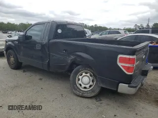 2010 Ford F-150 XL with VIN 1FTMF1CW1AKC09582, listed as a Copart auction lot 54296315 with 127,439 mi miles and Salvage title. Bid and sale history available at DreamBid. Image 2.