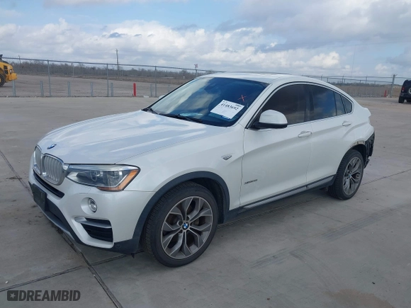 2015 BMW X4 xDrive28i with VIN 5UXXW3C53F0M88714, listed as a IAAI auction lot 41483692 with 132,054 mi miles. Bid and sale history available at carsss.com. Image 17.