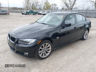 2011 BMW 3 Series 328i xDrive with VIN WBAPK7C50BA816306, listed as a IAAI auction lot 41950040 with 243,166 mi miles. Bid and sale history available at carsss.com. Image 2.