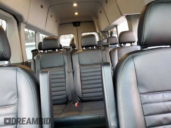 2023 Ford Transit with VIN 1FBVU4X8XPKB63870, listed as a Copart auction lot 82731504 with 7,576 mi miles and Salvage Title. Bid and sale history available at DreamBid. Image 10.