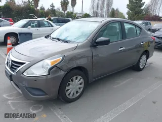 2015 Nissan Versa SV with VIN 3N1CN7AP7FL811747, listed as a IAAI auction lot 41911815 with 246,165 mi miles. Bid and sale history available at carsss.com. Image 2.