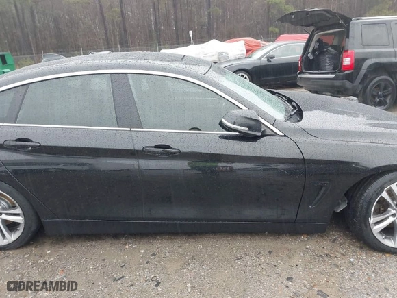 2019 BMW 4 Series 430i with VIN WBA4J1C55KBM16738, listed as a IAAI auction lot 41559766 with 103,258 mi miles. Bid and sale history available at carsss.com. Image 13.
