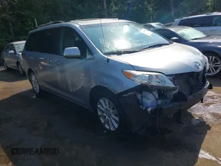 2014 Toyota Sienna Limited with VIN 5TDDK3DC0ES087274, listed as a IAAI auction lot 42478942 with 102,265 mi miles and . Bid and sale history available at DreamBid. Image 1.