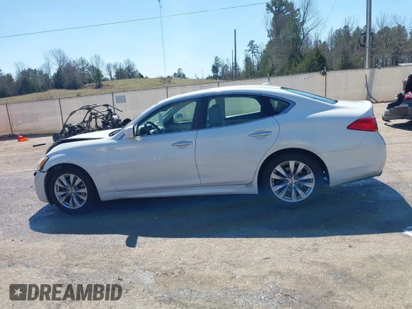 2011 Infiniti M with VIN JN1BY1AP8BM325061, listed as a IAAI auction lot 41765214 with 289,990 mi miles and . Bid and sale history available at DreamBid. Image 14.