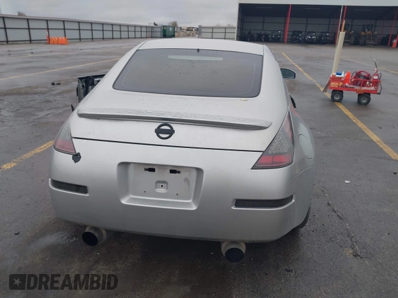 2003 Nissan 350Z Touring z VIN JN1AZ34E43T014247, wystawiony jako IAAI lot #42120812 z przebiegiem 112 263 mil mil oraz . Historia ofert i sprzedaży dostępna na DreamBid. Obrazek 16.