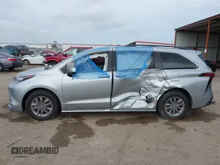 2021 Toyota Sienna XLE with VIN 5TDYRKEC9MS041334, listed as a IAAI auction lot 42145698 with 117,229 mi miles and . Bid and sale history available at DreamBid. Image 14.