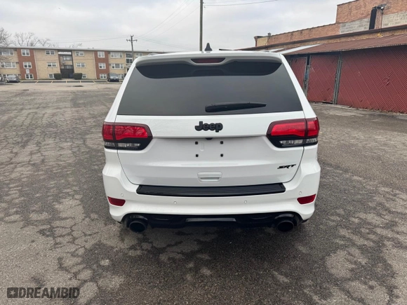 2021 Jeep Grand Cherokee SRT with VIN 1C4RJFDJXMC768325, listed as a Copart auction lot 52925255 with 14,833 mi miles and Clean Title. Bid and sale history available at carsss.com. Image 6.