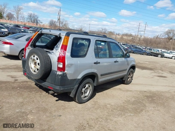 2003 Honda CR-V LX with VIN SHSRD78583U136394, listed as a IAAI auction lot 41701109 with 167,435 mi miles. Bid and sale history available at carsss.com. Image 4.