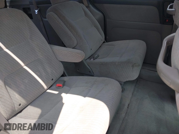 2004 Honda Odyssey LX with VIN 5FNRL18504B129349, listed as a IAAI auction lot 42393492 with 243,232 mi miles and . Bid and sale history available at DreamBid. Image 8.