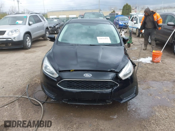 2016 Ford Focus SE with VIN 1FADP3F26GL280805, listed as a IAAI auction lot 42031492 with 146,986 mi miles. Bid and sale history available at carsss.com. Image 12.