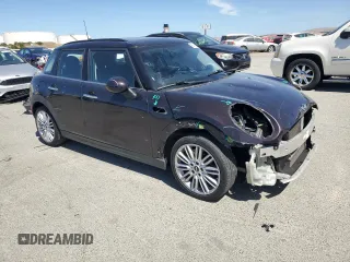 2015 MINI Hardtop 4 Door z VIN WMWXS5C57FT829133, wystawiony jako Copart lot #58764405 z przebiegiem 63 774 mil mil oraz Szkoda całkowita • Salvage title. Historia ofert i sprzedaży dostępna na DreamBid. Obrazek 4.