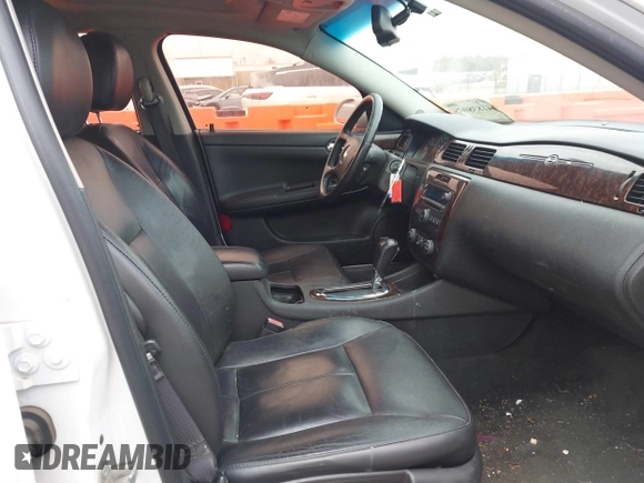 2013 Chevrolet Impala LTZ with VIN 2G1WC5E34D1152402, listed as a IAAI auction lot 41838035 with 214,088 mi miles and . Bid and sale history available at DreamBid. Image 5.