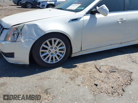 2012 Cadillac CTS z VIN 1G6DA5E51C0151324, wystawiony jako IAAI lot #41811207 z przebiegiem 100 407 mil mil oraz . Historia ofert i sprzedaży dostępna na DreamBid. Obrazek 13.