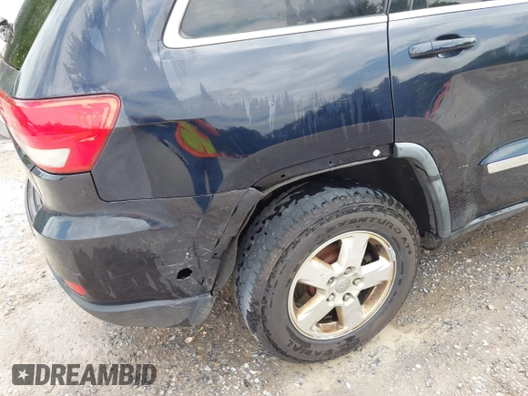 2011 Jeep Grand Cherokee Laredo with VIN 1J4RR4GG8BC543468, listed as a IAAI auction lot 42431481 with 224,639 mi miles and . Bid and sale history available at DreamBid. Image 19.