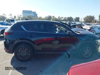 2017 Mazda CX-5 Touring with VIN JM3KFACL2H0146213, listed as a IAAI auction lot 41626112 with 77,829 mi miles and . Bid and sale history available at carsss.com. Image 13.