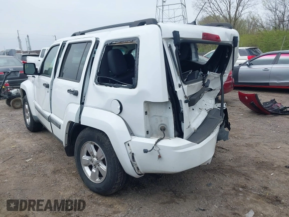 2012 Jeep Liberty Sport with VIN 1C4PJMAKXCW100451, listed as a IAAI auction lot 41987230 with 83,904 mi miles and . Bid and sale history available at DreamBid. Image 3.
