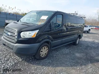 2016 Ford Transit Wagon XL with VIN 1FBZX2ZM2GKA65763, listed as a IAAI auction lot 41912092 with 208,401 mi miles. Bid and sale history available at carsss.com. Image 2.