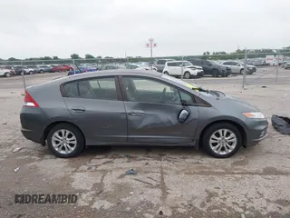 2012 Honda Insight EX z VIN JHMZE2H79CS004299, wystawiony jako IAAI lot #42296207 z przebiegiem 170 288 mil mil oraz . Historia ofert i sprzedaży dostępna na DreamBid. Obrazek 13.