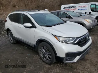 2020 Honda CR-V Touring with VIN 2HKRW2H96LH654268, listed as a Copart auction lot 47172605 with 57,086 mi miles and Salvage Title. Bid and sale history available at DreamBid. Image 4.