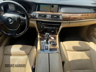 2015 BMW 7 Series 750i xDrive with VIN WBAYB6C5XFD965910, listed as a Copart auction lot 55407895 with 173,486 mi miles and Salvage Title. Bid and sale history available at carsss.com. Image 8.