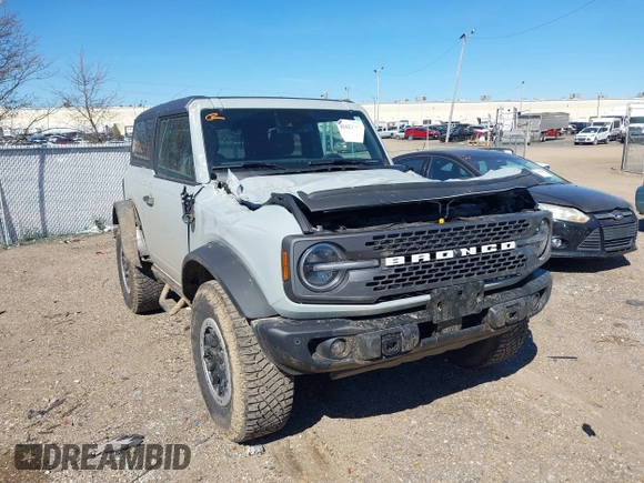 2023 Ford Bronco with VIN 1FMDE5CP0PLC17397, listed as a IAAI auction lot 41622763 with 21,799 mi miles. Bid and sale history available at carsss.com. Image 1.