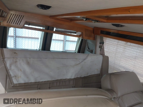 1996 Ford Econoline Cargo z VIN 1FDEE14H2THB68737, wystawiony jako IAAI lot #41919471 z przebiegiem Nie podano mil oraz . Historia ofert i sprzedaży dostępna na DreamBid. Obrazek 12.