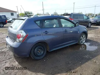 2009 Pontiac Vibe with VIN 5Y2SM67069Z422076, listed as a IAAI auction lot 42158045 with 180,568 mi miles. Bid and sale history available at carsss.com. Image 4.