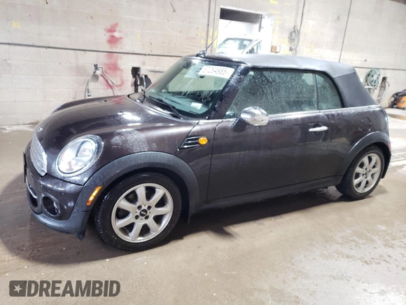 2015 MINI Convertible z VIN WMWZN3C59FT266929, wystawiony jako Copart lot #57264985 z przebiegiem 110 200 mil mil oraz Szkoda całkowita • Salvage title. Historia ofert i sprzedaży dostępna na DreamBid. Obrazek 1.