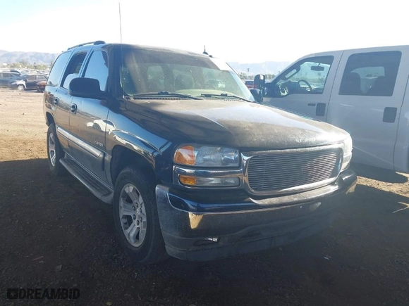 2005 GMC Yukon SLT with VIN 1GKEC13T35J185918, listed as a IAAI auction lot 41025720 with 162,613 mi miles. Bid and sale history available at carsss.com. Image 1.