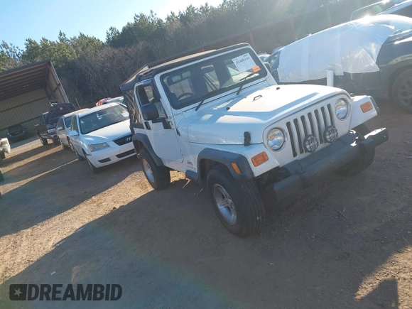2004 Jeep Wrangler Sport Right Hand Drive with VIN 1J4F449S74P732854, listed as a IAAI auction lot 41408316 with 112,064 mi miles. Bid and sale history available at carsss.com. Image 1.