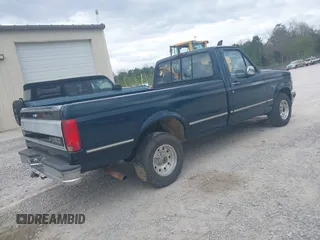1995 Ford F-150 with VIN 1FTEF15N3SLB27468, listed as a IAAI auction lot 41848685 with 163,044 mi miles. Bid and sale history available at carsss.com. Image 4.