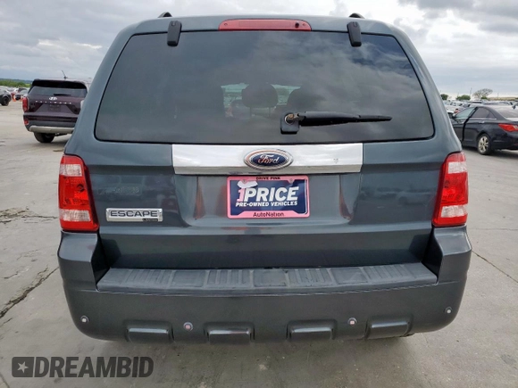 2008 Ford Escape Limited z VIN 1FMCU04138KB77500, wystawiony jako Copart lot #51249415 z przebiegiem 106 667 mil mil oraz Szkoda całkowita • Salvage title. Historia ofert i sprzedaży dostępna na DreamBid. Obrazek 6.