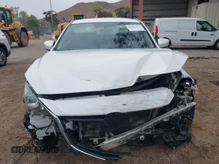 2015 Mazda 3 i Touring with VIN 3MZBM1V70FM231234, listed as a IAAI auction lot 42007526 with 114,255 mi miles. Bid and sale history available at carsss.com. Image 11.