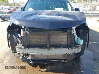 2020 Chevrolet Traverse LS with VIN 1GNERFKW7LJ207118, listed as a IAAI auction lot 41883048 with 87,506 mi miles. Bid and sale history available at carsss.com. Image 6.