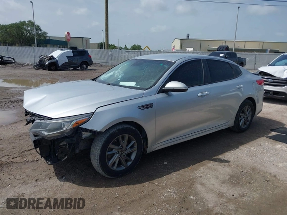 2019 Kia Optima LX z VIN 5XXGT4L37KG281329, wystawiony jako IAAI lot #42434855 z przebiegiem 113 448 mil mil oraz . Historia ofert i sprzedaży dostępna na DreamBid. Obrazek 2.