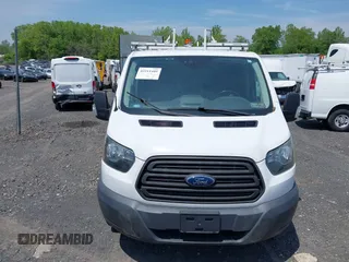 2016 Ford Transit Cargo z VIN 1FTYR1YM0GKB55605, wystawiony jako IAAI lot #42211489 z przebiegiem Nie podano mil oraz . Historia ofert i sprzedaży dostępna na DreamBid. Obrazek 12.