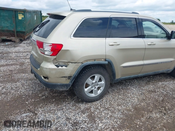 2011 Jeep Grand Cherokee Laredo with VIN 1J4RR4GG8BC558018, listed as a IAAI auction lot 42347367 with 180,334 mi miles and . Bid and sale history available at DreamBid. Image 6.