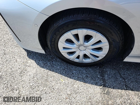 2021 Toyota Prius L Eco with VIN JTDKAMFU4M3144050, listed as a IAAI auction lot 42774220 with 173,180 mi miles and . Bid and sale history available at DreamBid. Image 12.