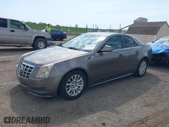 2012 Cadillac CTS Luxury with VIN 1G6DE5E56C0132613, listed as a IAAI auction lot 42116862 with 81,617 mi miles and . Bid and sale history available at DreamBid. Image 2.