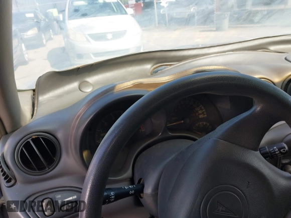 1999 Pontiac Grand Am SE with VIN 1G2NE52TXXC553246, listed as a IAAI auction lot 42398103 with Not provided miles and . Bid and sale history available at DreamBid. Image 7.