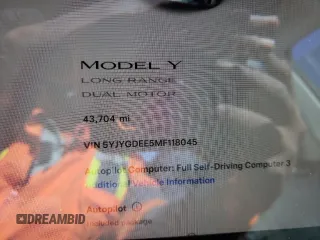 2021 Tesla Model Y Long Range with VIN 5YJYGDEE5MF118045, listed as a Copart auction lot 50790065 with 43,704 mi miles and Salvage Title. Bid and sale history available at DreamBid. Image 9.