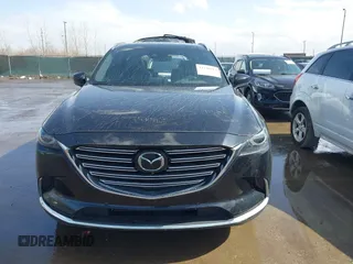 2020 Mazda CX-9 Grand Touring with VIN JM3TCBDY2L0413839, listed as a IAAI auction lot 41720713 with 48,964 mi miles and . Bid and sale history available at DreamBid. Image 13.