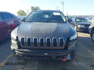 2014 Jeep Cherokee Trailhawk with VIN 1C4PJMBS6EW167517, listed as a IAAI auction lot 41947552 with 233,572 mi miles. Bid and sale history available at carsss.com. Image 13.