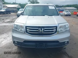 2015 Honda Pilot EX-L with VIN 5FNYF4H5XFB014653, listed as a IAAI auction lot 42121003 with 152,912 mi miles and . Bid and sale history available at carsss.com. Image 13.